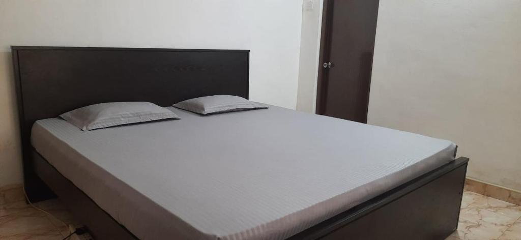 Postel nebo postele na pokoji v ubytování Corner Cottage - Anuradhapura