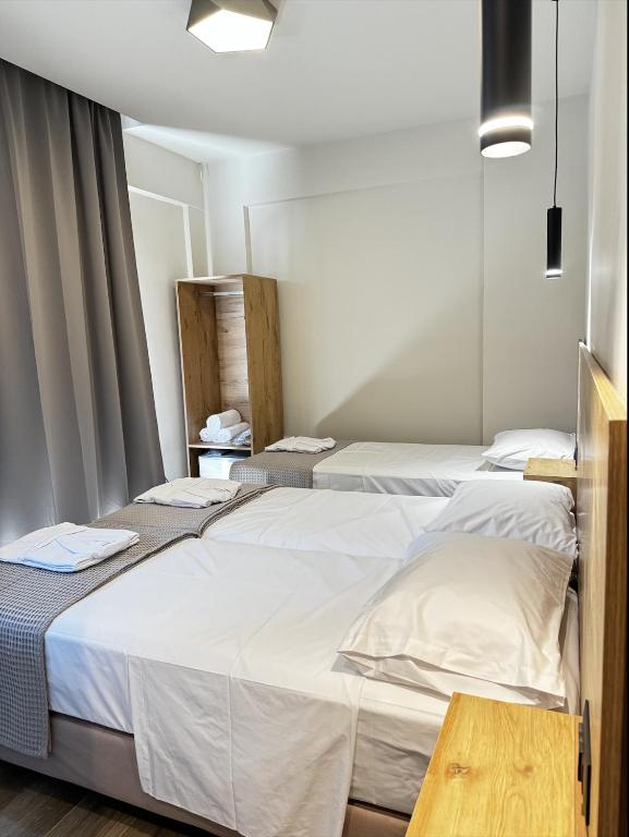 Postel nebo postele na pokoji v ubytování Lunar Hotel Modern Boutique