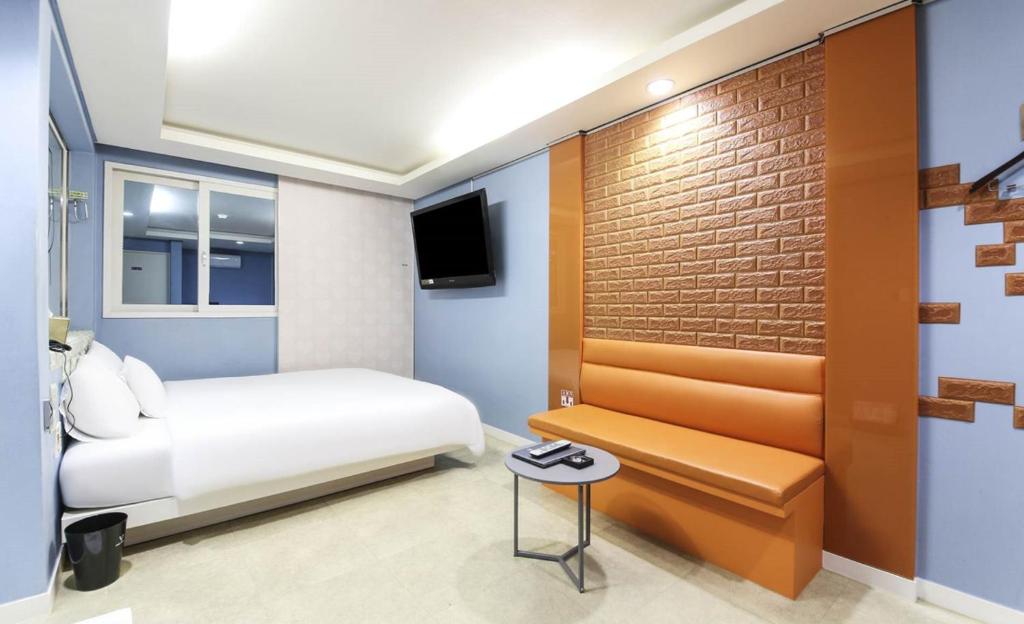 TV a/nebo společenská místnost v ubytování Songjeong V Hotel