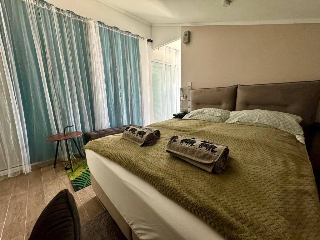 Posteľ alebo postele v izbe v ubytovaní Borbara Apartman