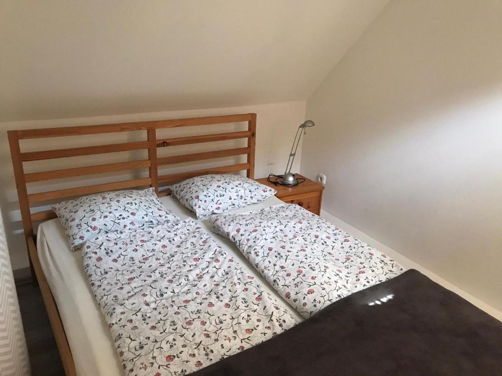 Posteľ alebo postele v izbe v ubytovaní Feng Shui Wellness Apartmanház Hévíz