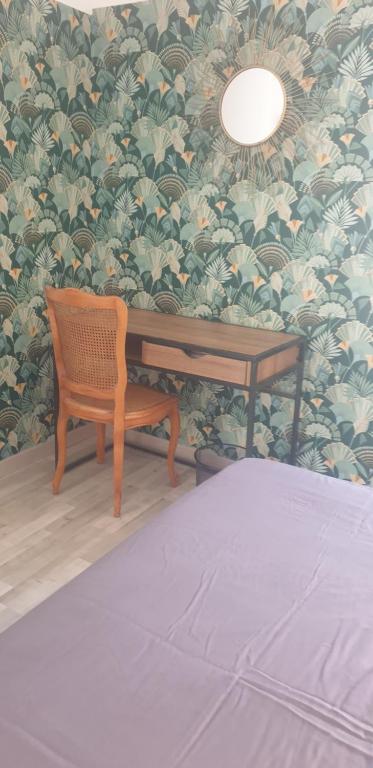 Postel nebo postele na pokoji v ubytování aux pieds des vignobles ardéchois logement de 40m2