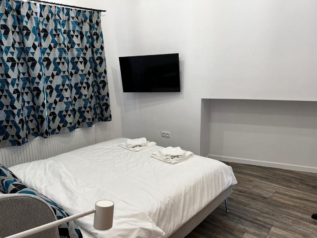 Postel nebo postele na pokoji v ubytování Casa Katona