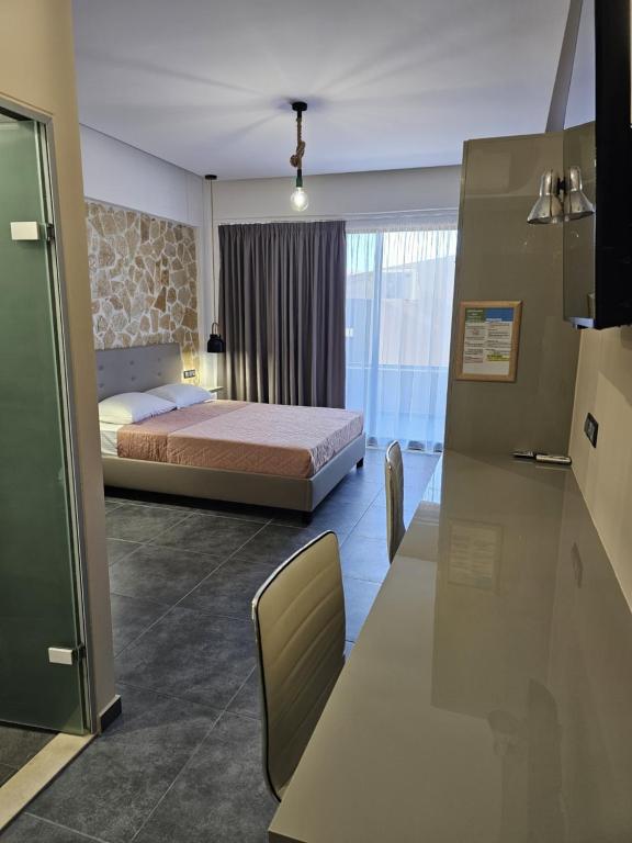 Posteľ alebo postele v izbe v ubytovaní The Santo George Beach Resort