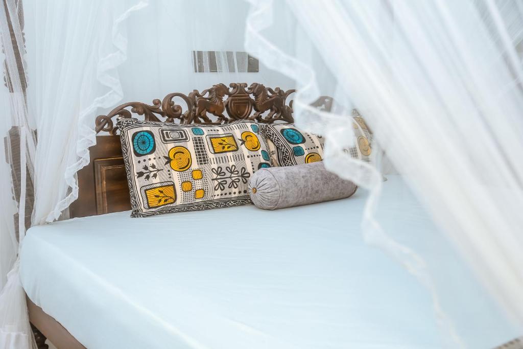 Postel nebo postele na pokoji v ubytování Royal Palace Mirissa