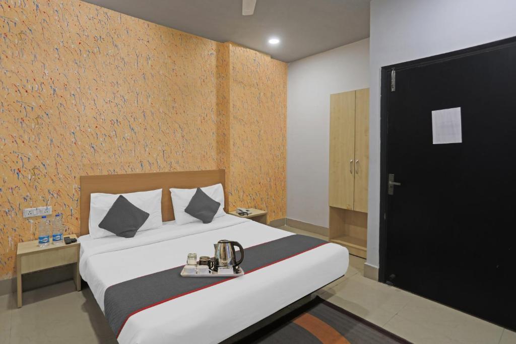 Postel nebo postele na pokoji v ubytování Super Townhouse Grand Pacific Ocean