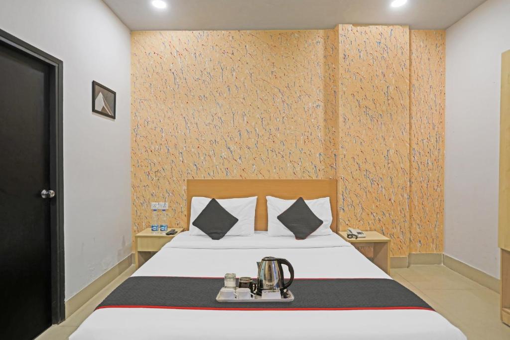 Postel nebo postele na pokoji v ubytování Super Townhouse Grand Pacific Ocean