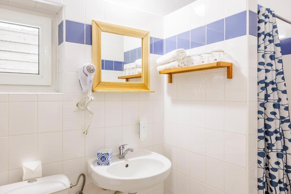 Koupelna v ubytování Hotel Kačenka