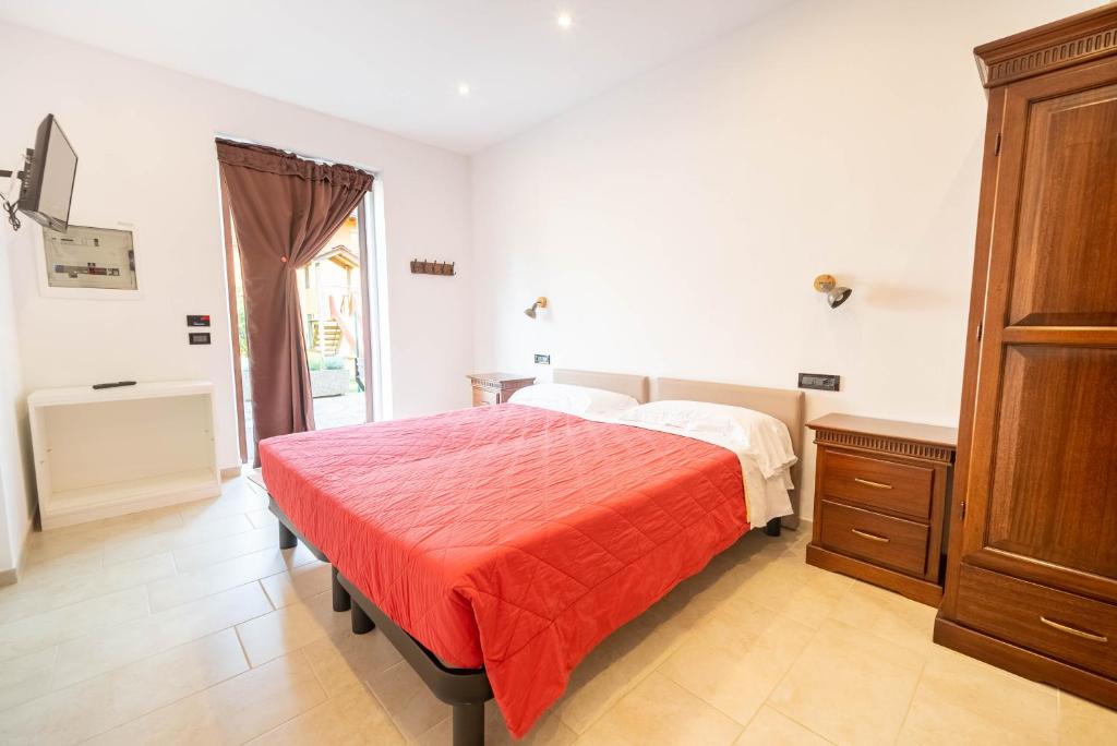Postel nebo postele na pokoji v ubytování Agriturismo Bortolino