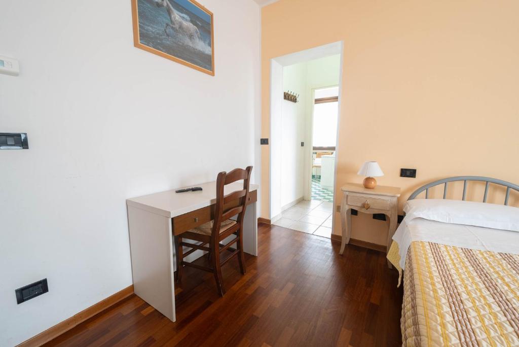 Postel nebo postele na pokoji v ubytování Agriturismo Bortolino