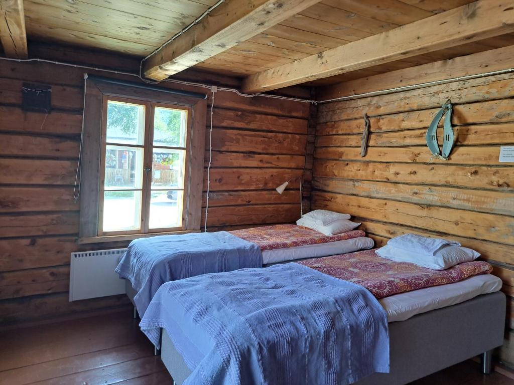 Postel nebo postele na pokoji v ubytování Lapinkylä