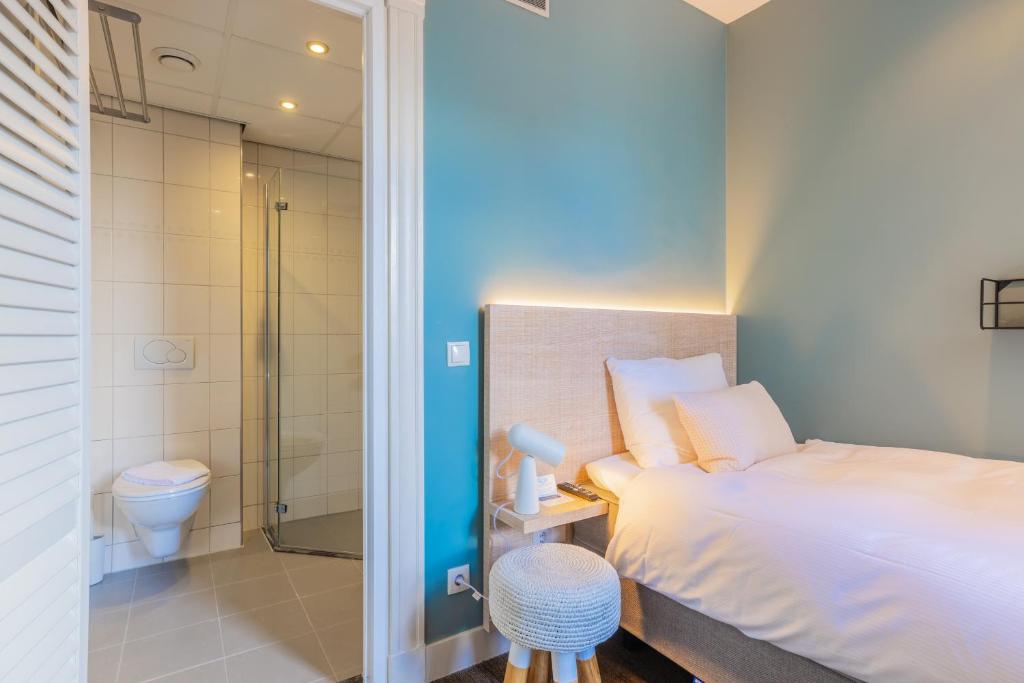 Een badkamer bij City Hotel Rembrandt