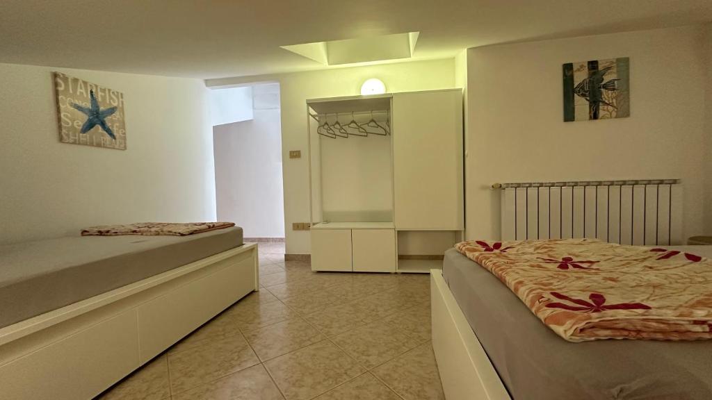 Postel nebo postele na pokoji v ubytování Apartments Aleksandra 1132
