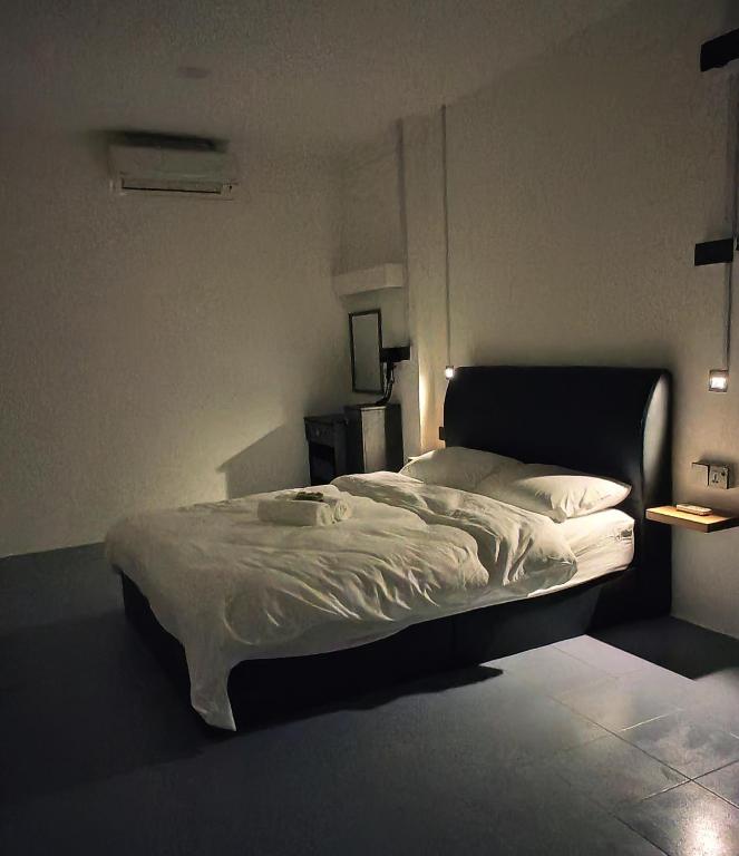 Postel nebo postele na pokoji v ubytování 23 Inn Queen Bed Standard Room
