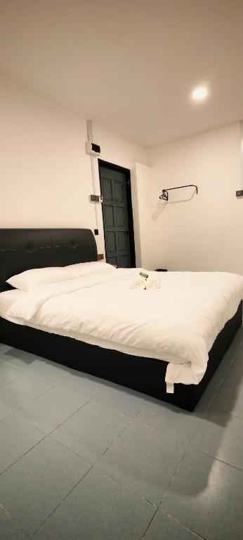 Postel nebo postele na pokoji v ubytování 23 Inn Queen Bed Standard Room