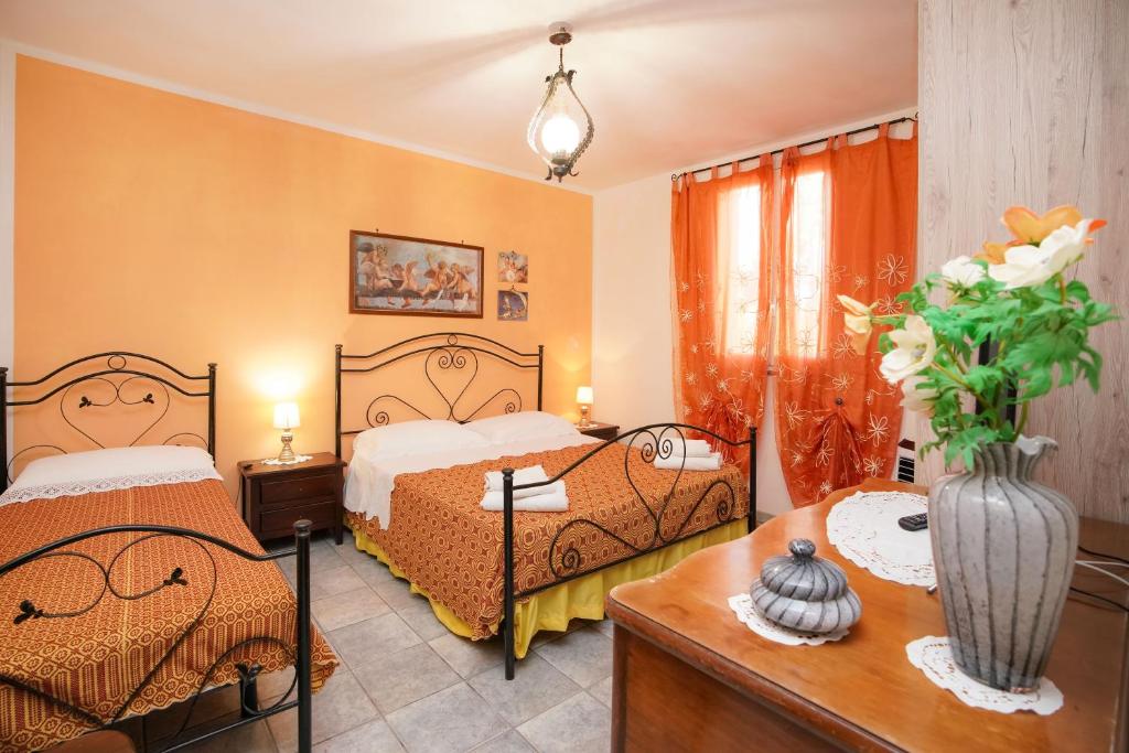 Postel nebo postele na pokoji v ubytování B&B San Giorgio