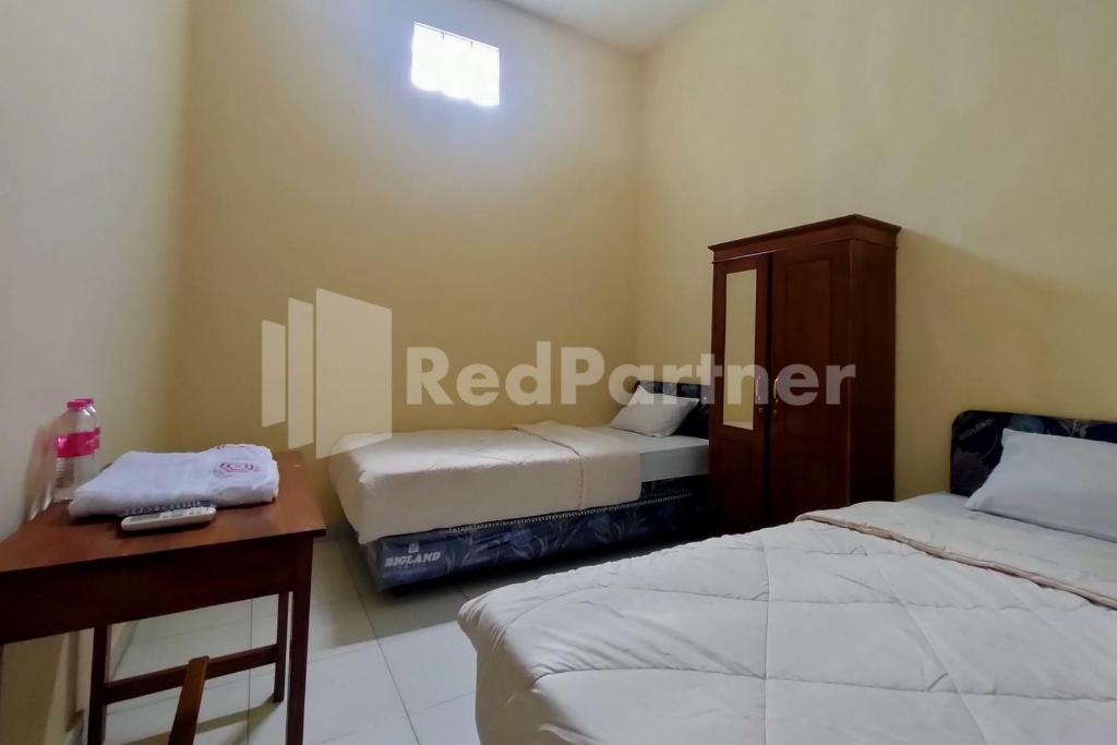 Sakeena Syariah Purwodadi RedPartner - Standaard Twin Room
