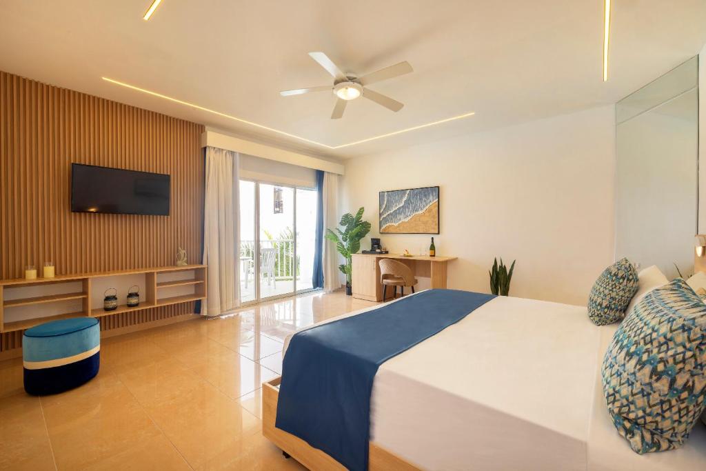 TV a/nebo společenská místnost v ubytování Hotel HM Alma de Bayahibe - Adults Only - All Inclusive