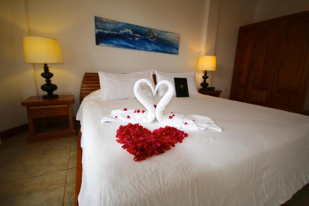 Postel nebo postele na pokoji v ubytování Hotel Angermeyer Waterfront Inn