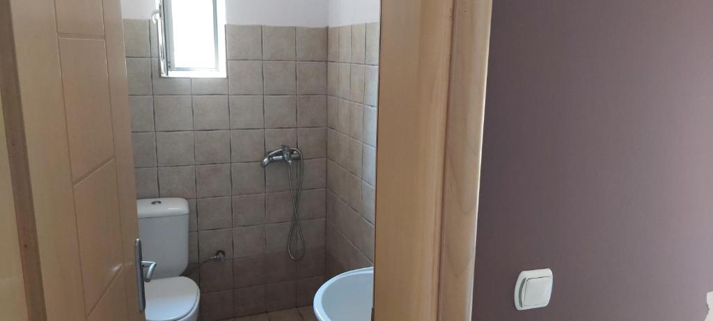 Koupelna v ubytování Ktima Holoway Apartments