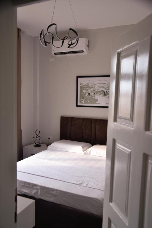 En eller flere senger på et rom på City Center INN