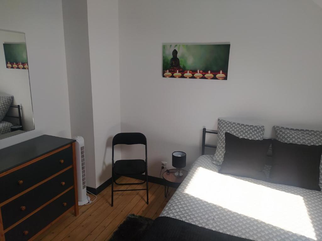 Postel nebo postele na pokoji v ubytování DS Harmothe