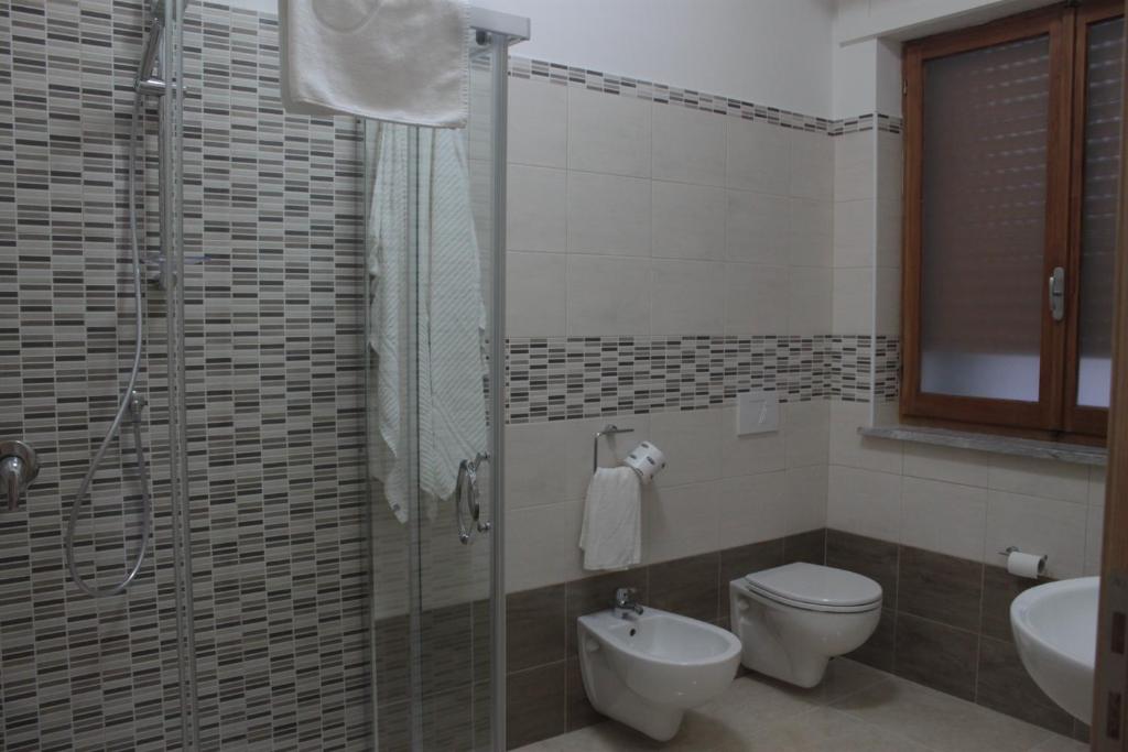 Koupelna v ubytování A'MANTIA HOTEL