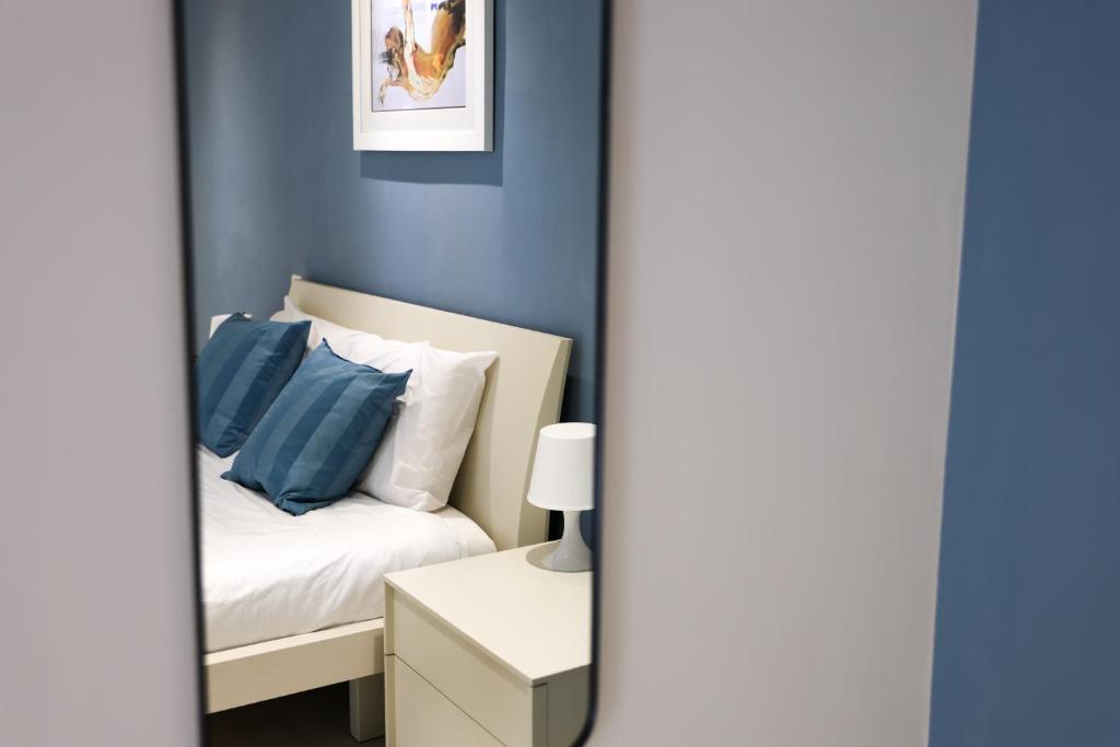 Ένα ή περισσότερα κρεβάτια σε δωμάτιο στο Gorgeous 2BR Gozo Apt with private balcony & Pool by 360 Estates