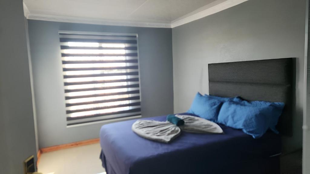 Postel nebo postele na pokoji v ubytování Monarca inn - Affordable Accomodation in makwane molapo location Qwaqwa