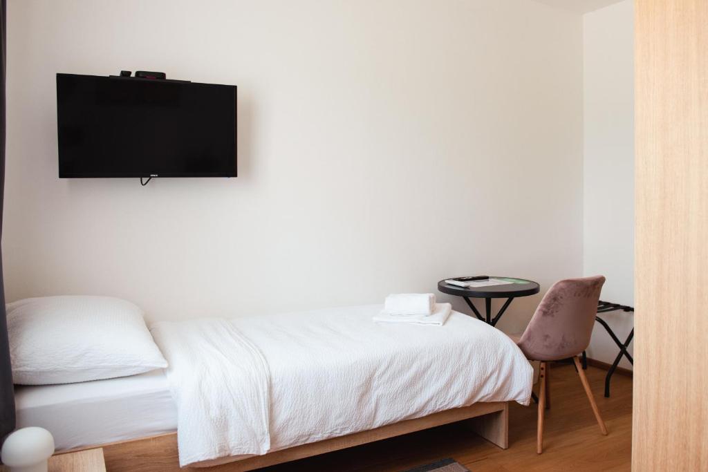 Postel nebo postele na pokoji v ubytování Rooms Enter Ogulin