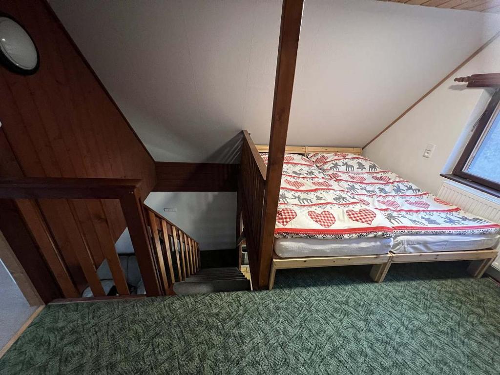 Postel nebo postele na pokoji v ubytování Chaloupka Krkonoše