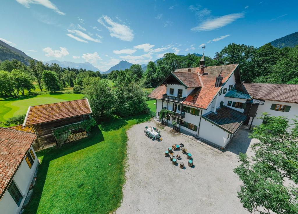 an aerial view of a house with a yard at Mountain Chalet on Gut Buchwies in Oberau