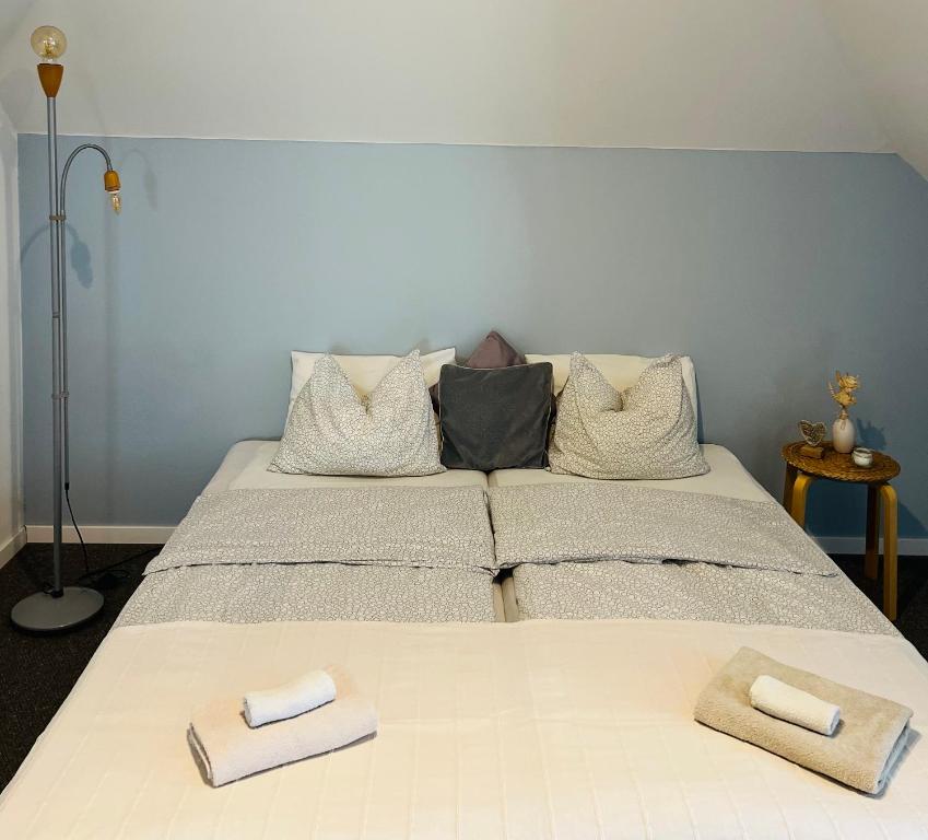 Postel nebo postele na pokoji v ubytování Jázmin vendégház és 2 fős stúdió apartman
