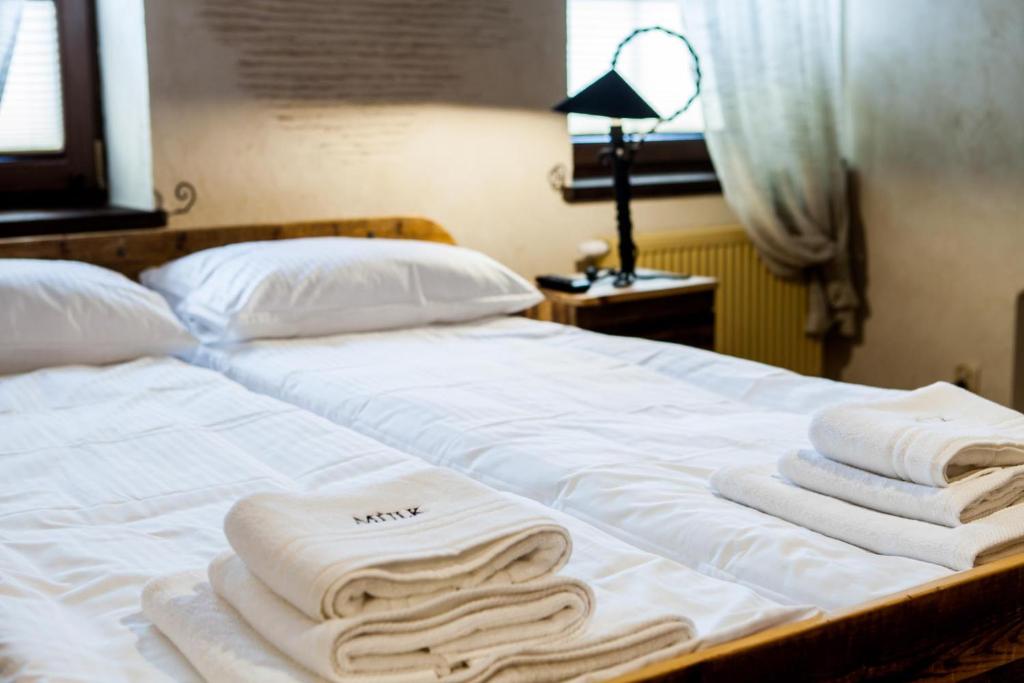 Letto o letti in una camera di Mùlk Chëcz Kaszëbsko