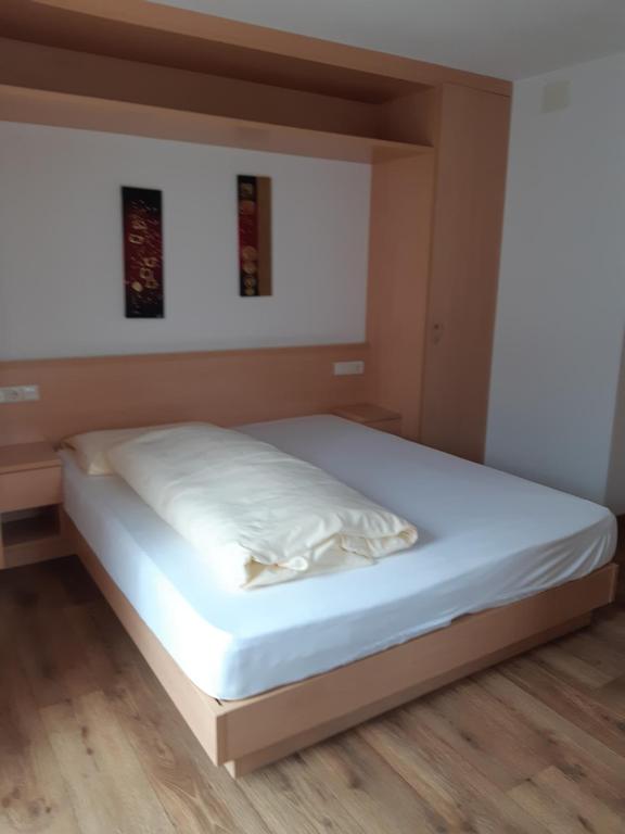 Postel nebo postele na pokoji v ubytování Pensione Valbona