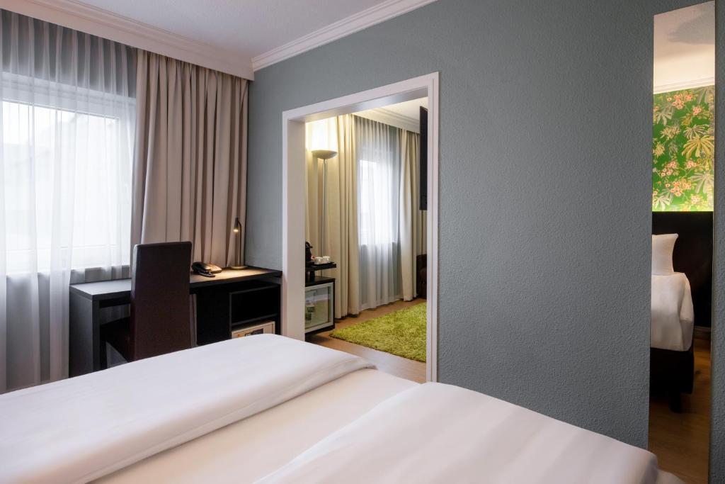 Rúm í herbergi á Thon Hotel Brussels Airport
