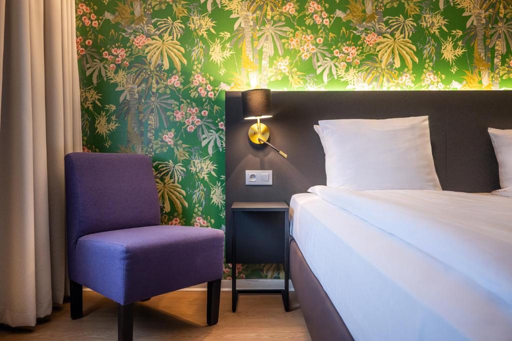 Rúm í herbergi á Thon Hotel Brussels Airport