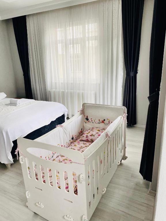 Postel nebo postele na pokoji v ubytování AYKA apart