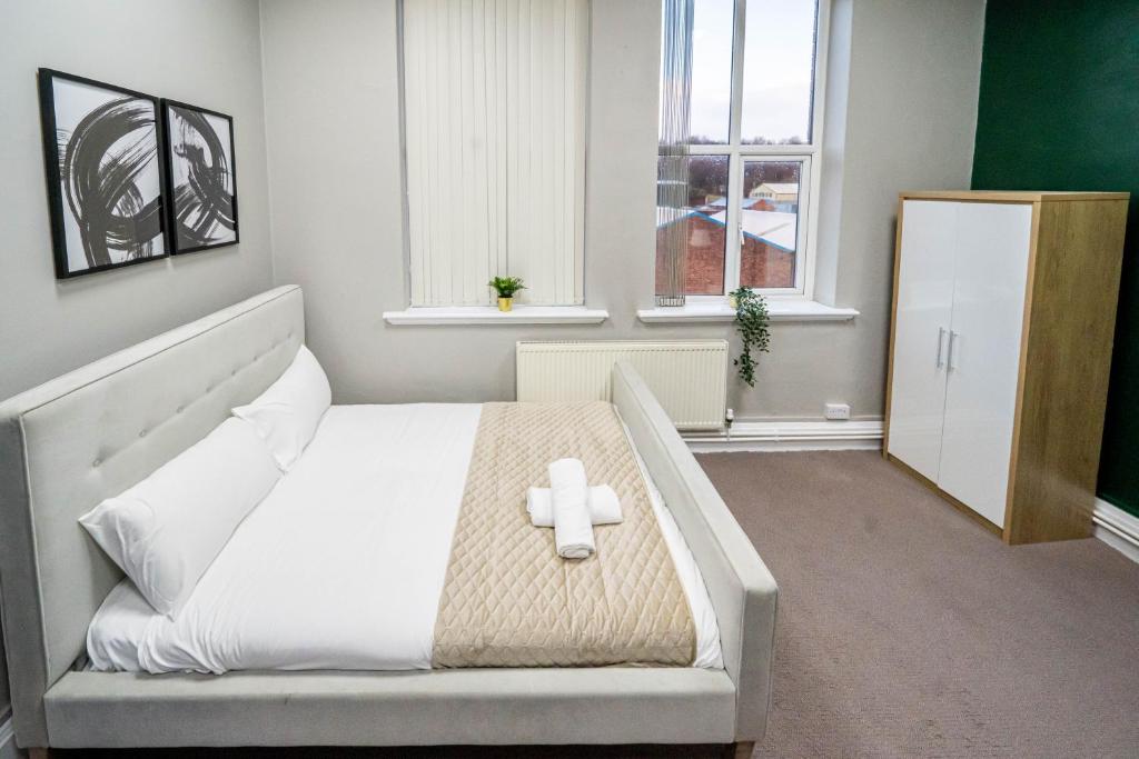 Postel nebo postele na pokoji v ubytování Bessemer Rooms