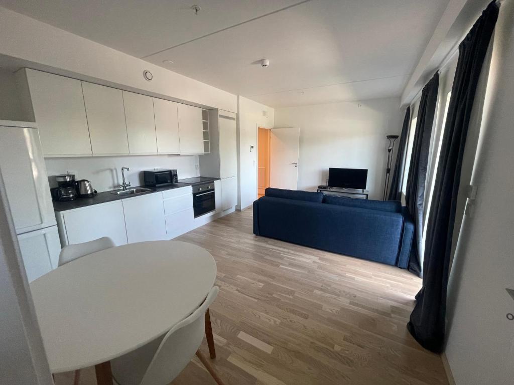 Kuchyň nebo kuchyňský kout v ubytování Mitt hotell & apartments