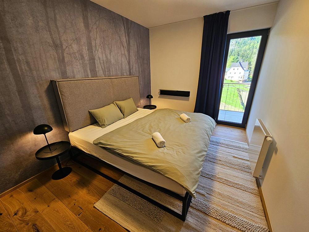 Postel nebo postele na pokoji v ubytování DeLuxe apartmán s terasou Janské Lázně 3 Ski&Bike by AlkaTravel