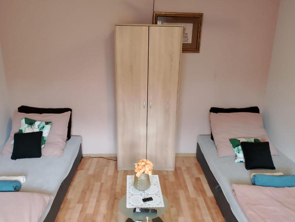 Łóżko lub łóżka w pokoju w obiekcie Apartament Rynek 30