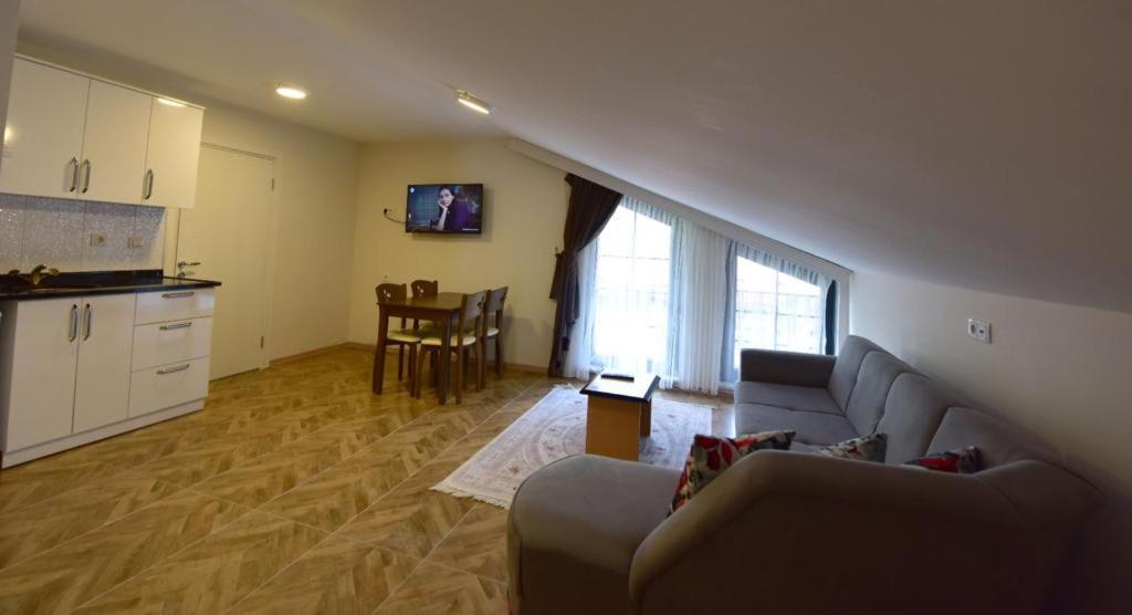 A kitchen or kitchenette at Anemo Suite