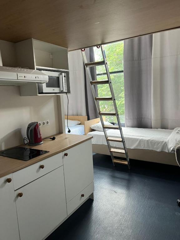 Llit o llits en una habitació de THH Apartments