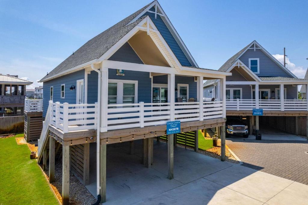 a house being constructed with a porch on it at NH387B Ocracoke Cottage in Nags Head