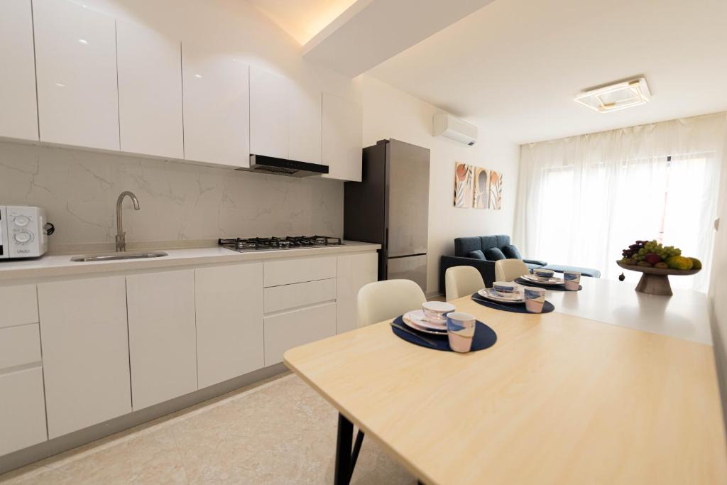 Kuchyň nebo kuchyňský kout v ubytování ViVi Aparthotel