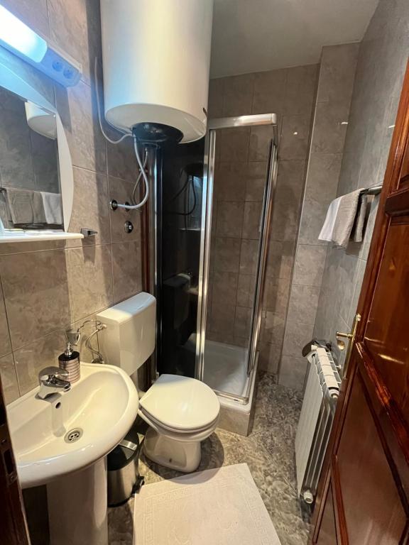 Koupelna v ubytování Hotel Dulovic
