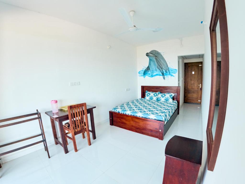Postel nebo postele na pokoji v ubytování Baden Beach Hotel