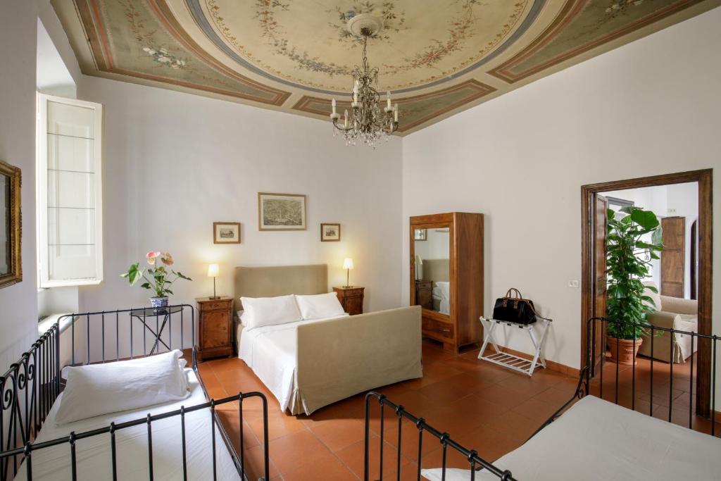 a living room with a couch and a ceiling at The Right Place 4U Quercia Apartment in Rome