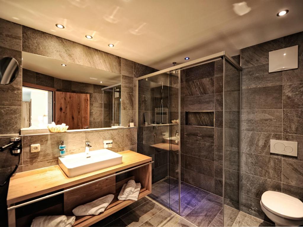 Koupelna v ubytování Hotel Dorfstadl